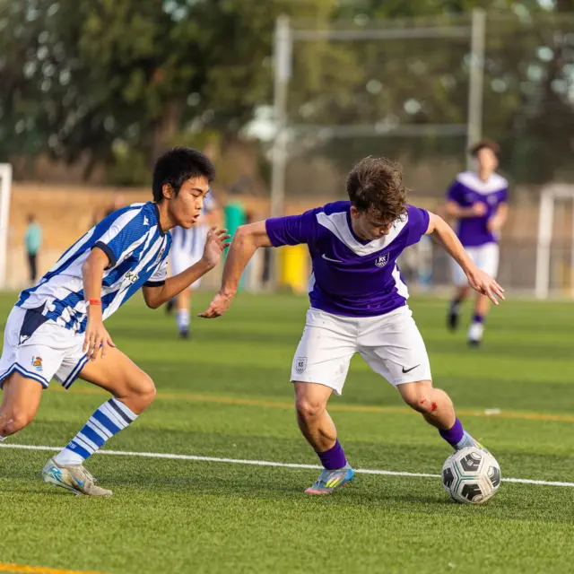 Adrian playing soccer